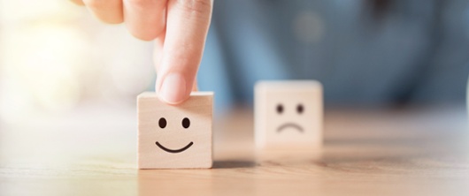 A picture of a building block with a smile