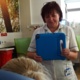 Occupational therapist uses iPad to film mum and baby
