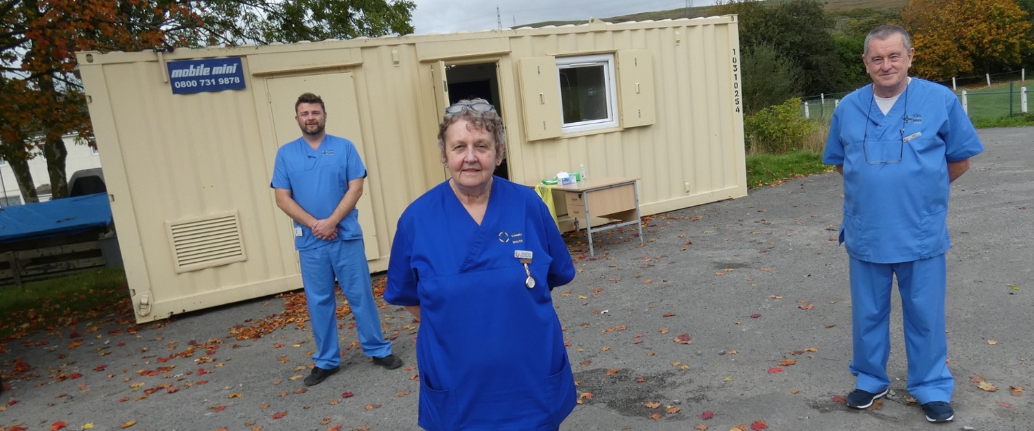 Health board staff with the local vaccination centre