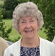 A portrait of Ann Newman smiling at the camera.