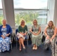 Images show nurses at a celebratory event