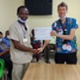 Dr Bryant presents certificate