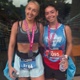 An image of Rachel Wales, with a friend, after completing Swansea Half Marathon.