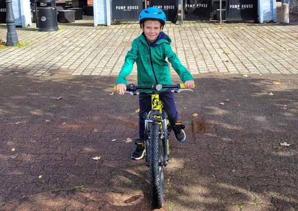 Image of Elliott on his bike at the start of the sponsored ride