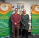 Martyn and Helen stood between cluster banners