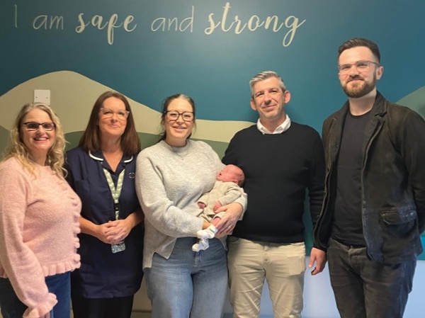 Parents of baby Franklyn Brooke and team who delivered him in ED