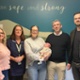 Parents of baby Franklyn Brooke and team who delivered him in ED