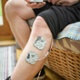 A man showing a medical device stuck to his leg
