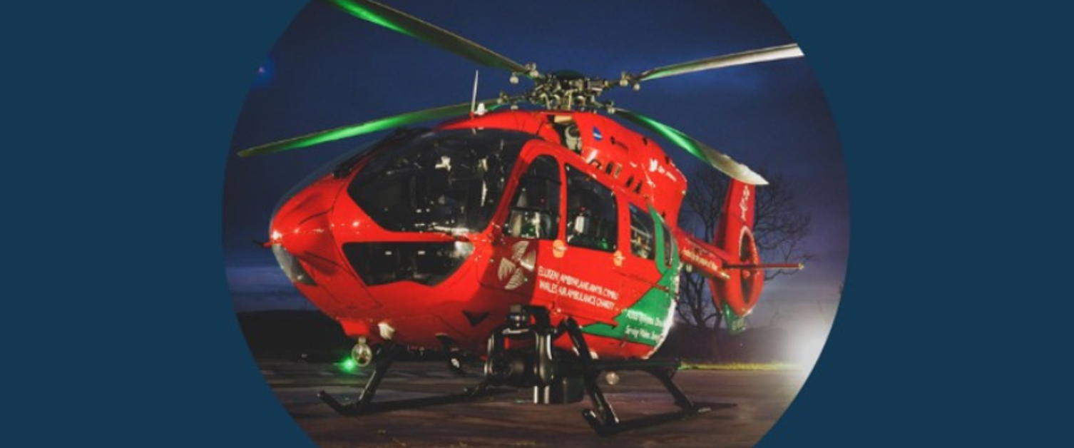 Image shows a red EMRTS helicopter