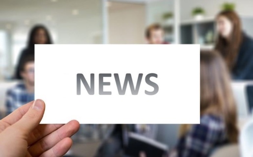 An image of the word news with people in the background