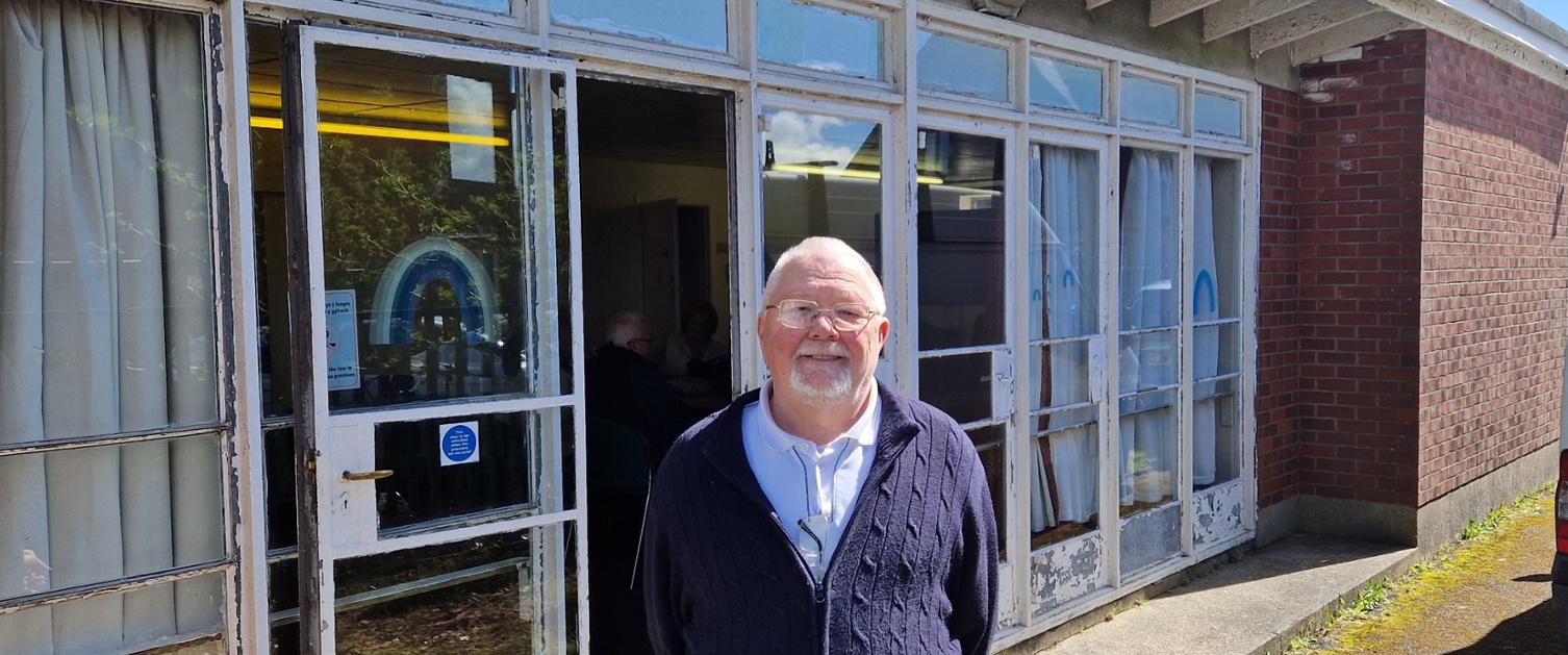 Peter Harris outside the new shed