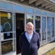 Peter Harris outside the new shed