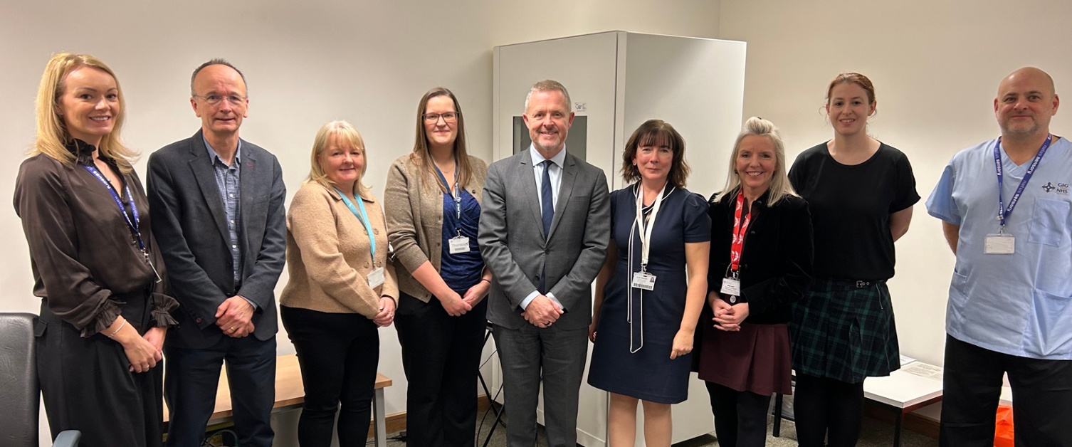 Jeremy Miles with members of staff from Swansea Bay