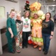 Kev in costume with staff from the Cancer Centre