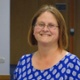 Image shows a woman 