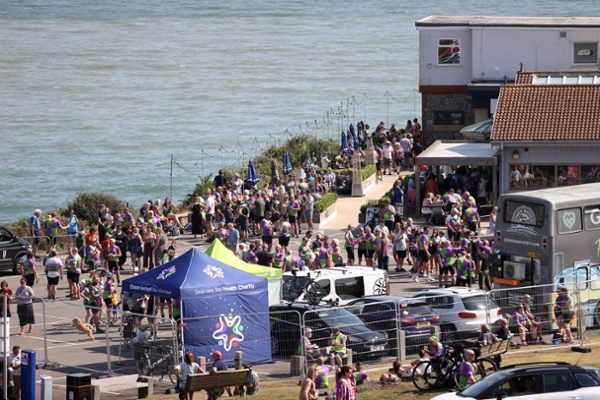 Hundreds of people congregating at the final destination of the bike ride
