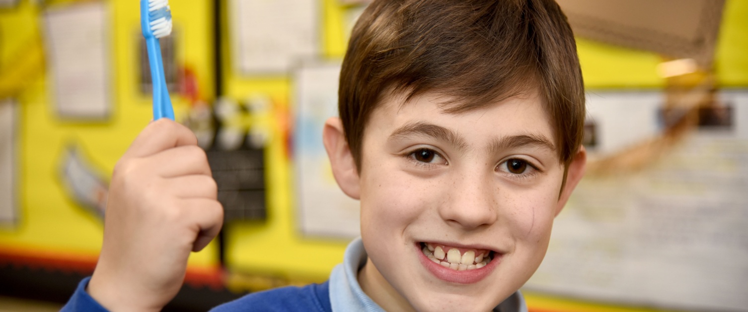 Young boy with toothbrush