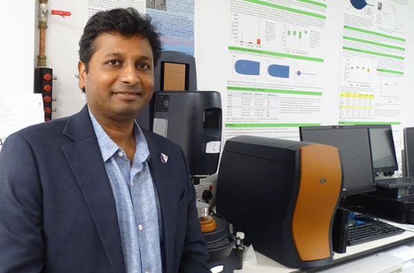 Image shows a clinician looking into the camera.
