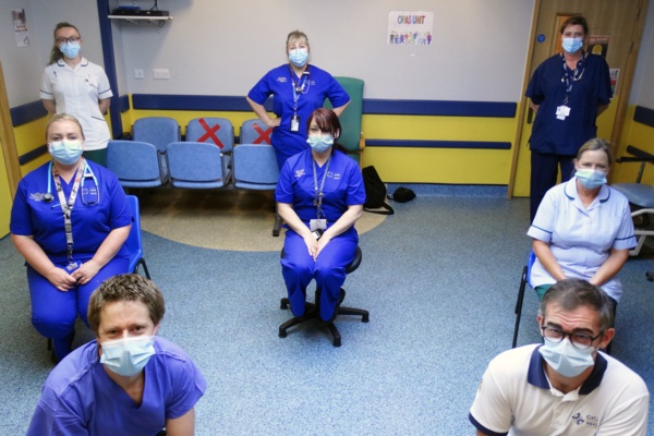 Group of hospital staff wearing masks