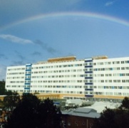 An image of Singleton Hospital with a rainbow above it.