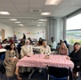 Images show nurses at a celebratory event