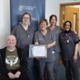 Leighton Davies is pictured with some of the staff who treated him.