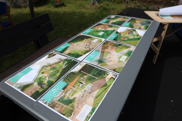 Artist impressions of a garden and playground