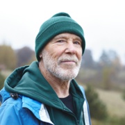 A picture of an older man in a bobble hat