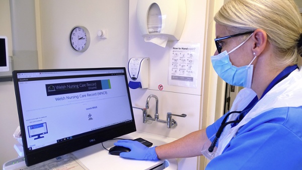 Picture shows a nurse using a computer