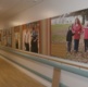 A corridor in the Specialist Rehabilitation Centre with images on the wall.