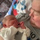 Leighton Davies holding baby Betty