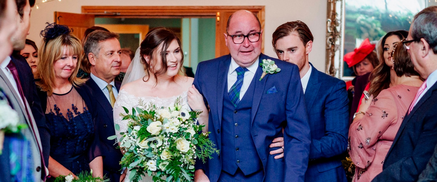 Bride walks down aisle