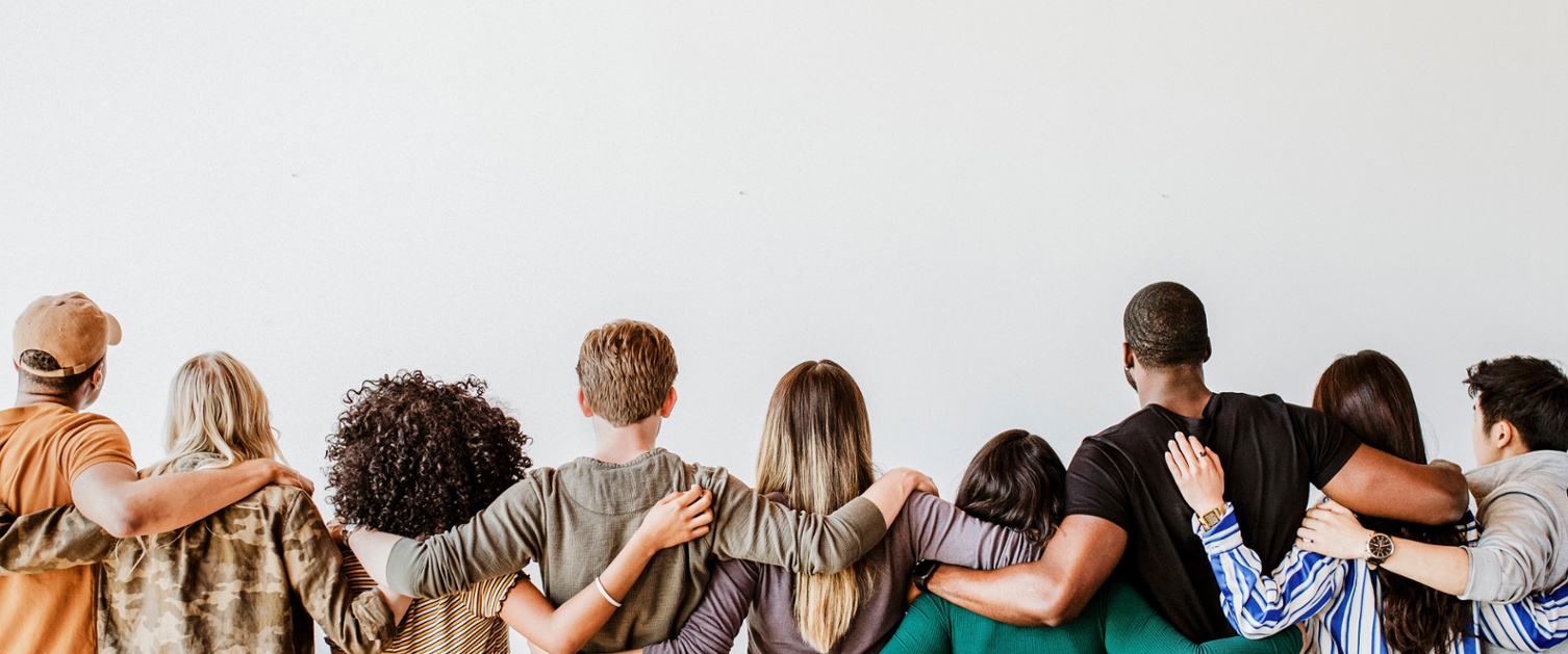 Image shows a group of people standing together.