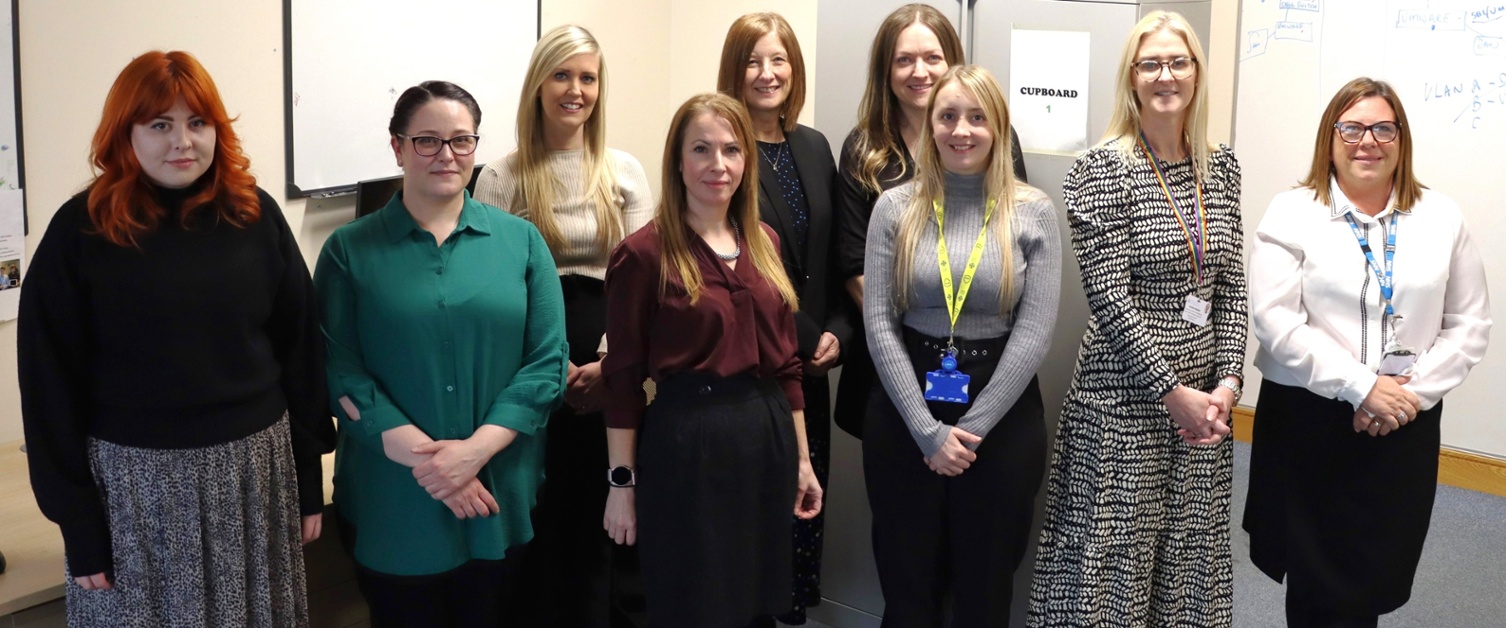 An image showing the women from the Digital Transformation Team, all smiling at the camera.