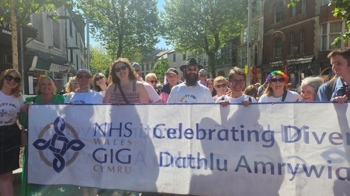 Image shows people during a Pride march
