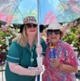Hospital staff pictured sheltering under a parasol and holding sunscreen