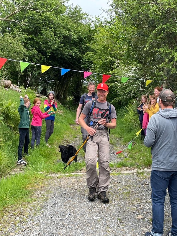 Well wishers cheers on Dean Osell on his fund raising walk 