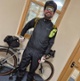 Image shows a man wearing cycling attire