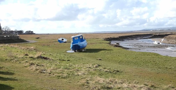 A boat on the bank of the Loughor estuary.