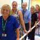 A variety of smiling Swansea Bay UHB staff