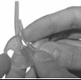 Image shows a pair of hands measuring the old and new tubing next to each other to compare the length.