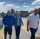 Alan walking with his wife and member of staff