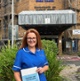 Ann-Marie stood outside the maternity building with a booklet