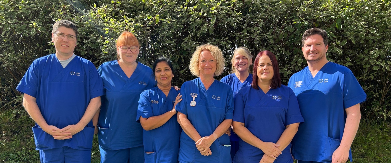 Members of the team stood outside