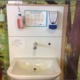 A hand basin for staff and parents to wash their hands at