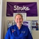 A portrait image of Ceri Eady in her blue nurse