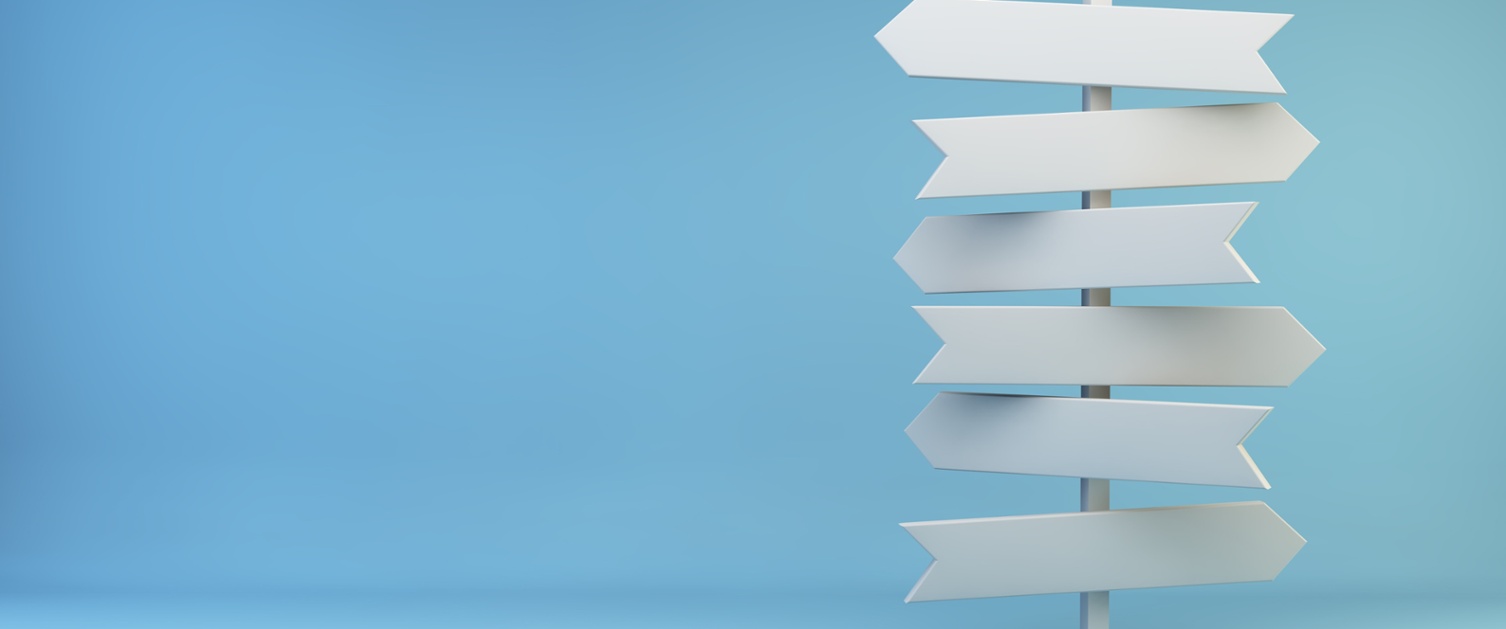 White signpost on a blue background.