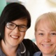Two midwives smiling