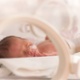 A picture of a baby in an incubator