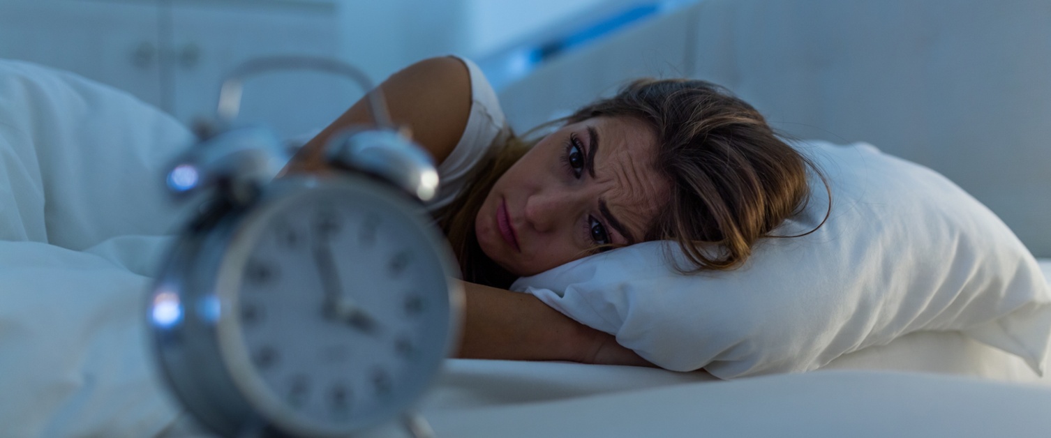 A picture of a woman with insomnia